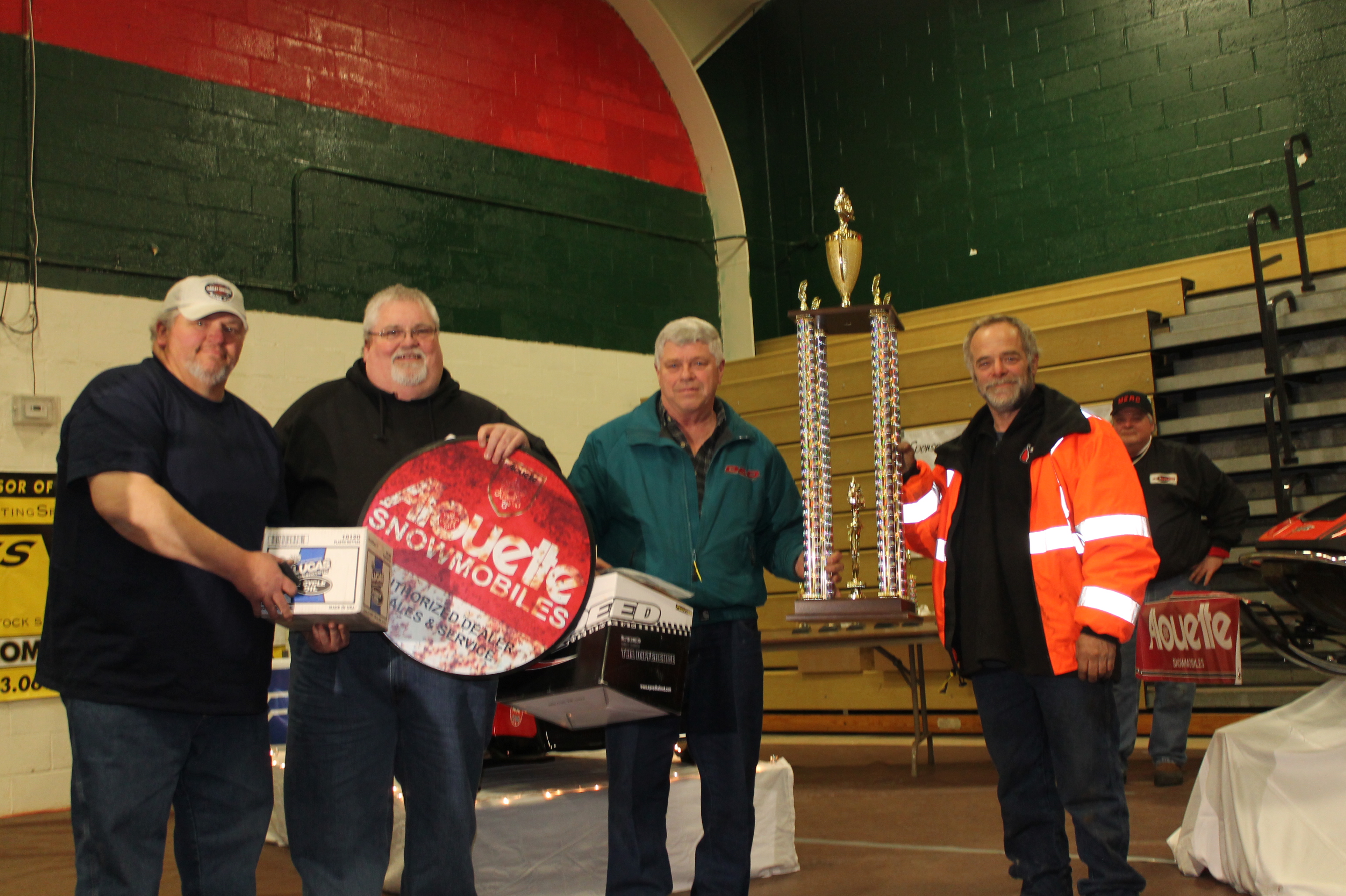 BEST OF SHOW WINNER TERRY INGERSAL ON LEFT RESTORER WENDALL ROBERTS SHOW ORGANIZERS TRACY DOYLE AND JIM LATINO